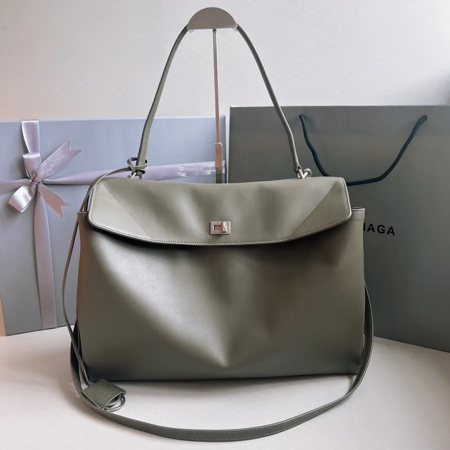 Baleenica Rodeo Luxury Bucket Bag with Grained Calfskin and Vintage Style