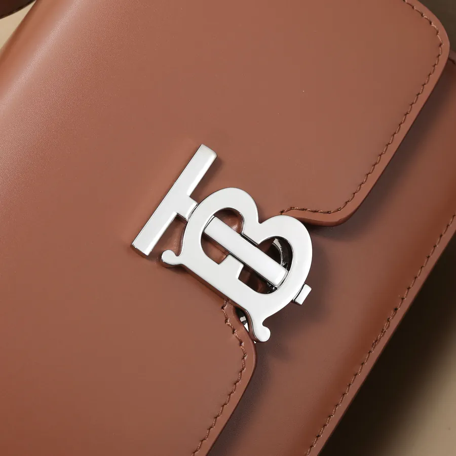 620 B House Mini Signature Leather Clasp Crossbody Bag