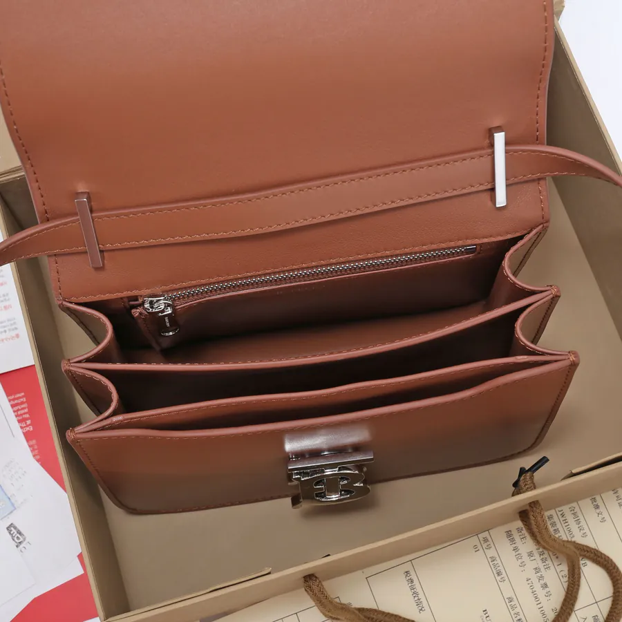 620 B House Mini Signature Leather Clasp Crossbody Bag