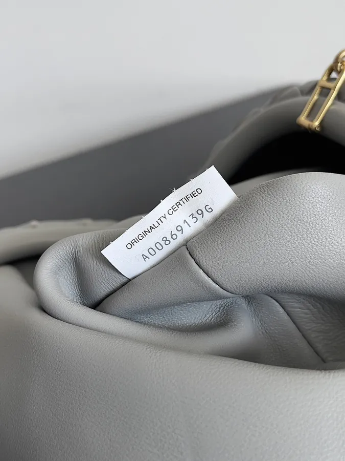 BOTTEGA VENETA Laurens Clutch with Chain Timeless Elegance
