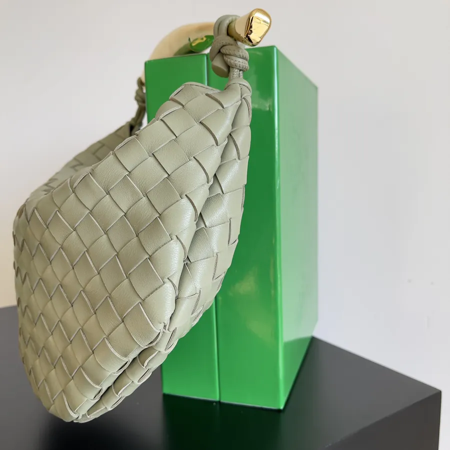 Muse Bronze Handle Sardine Bag Modern Sculptural Design
