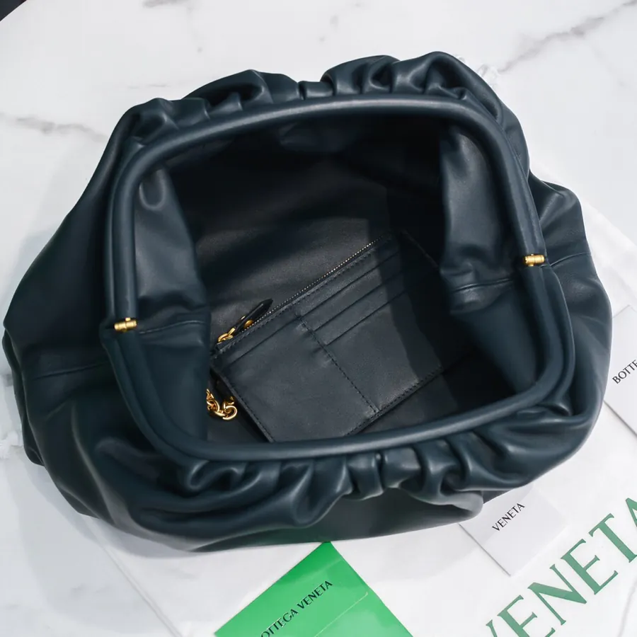 Bottea Veneta Pouch Bag Grained Calfskin, Sophisticated and Versatile