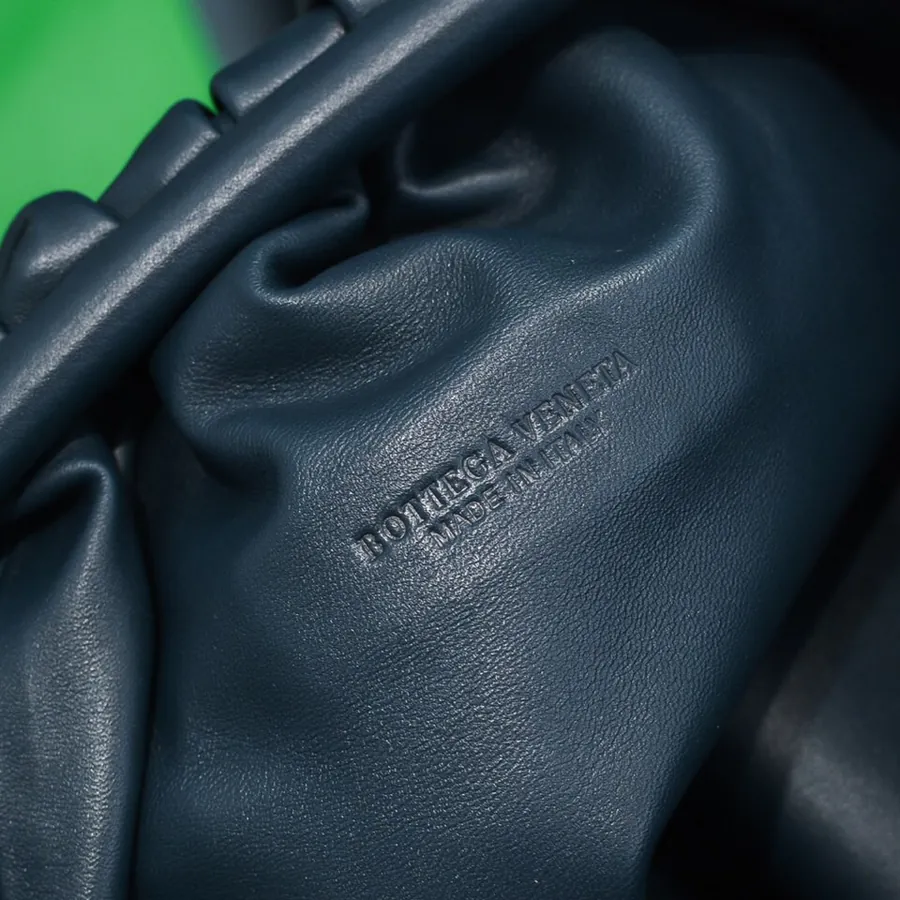 Bottea Veneta Pouch Bag Grained Calfskin, Sophisticated and Versatile