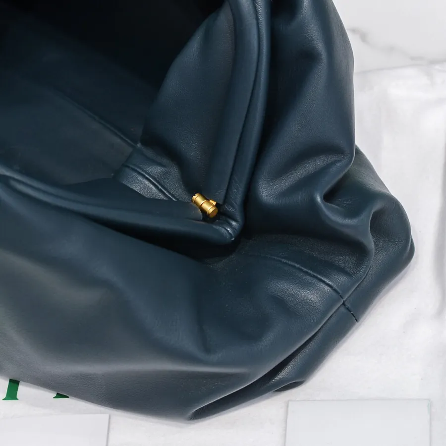 Bottea Veneta Pouch Bag Grained Calfskin, Sophisticated and Versatile