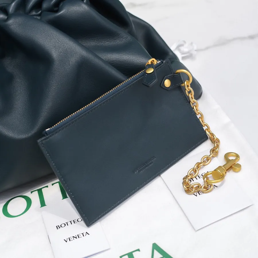 Bottea Veneta Pouch Bag Grained Calfskin, Sophisticated and Versatile