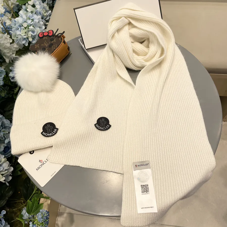 P150 MONTI Wool with Fox Fur Ball