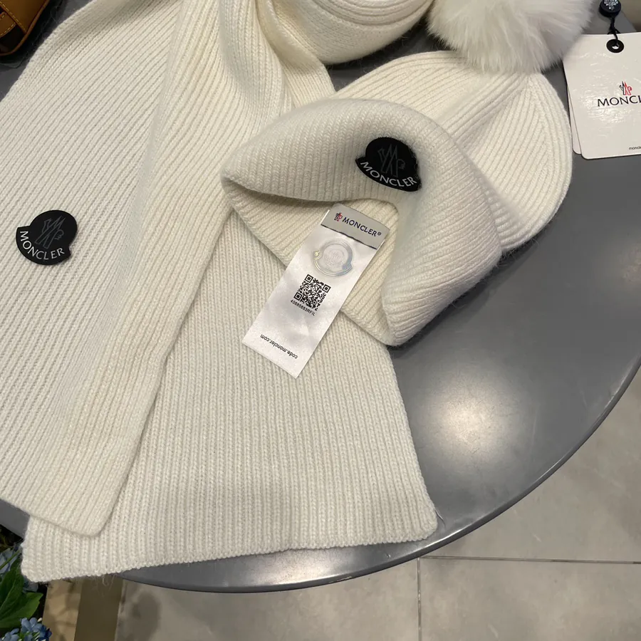P150 MONTI Wool with Fox Fur Ball