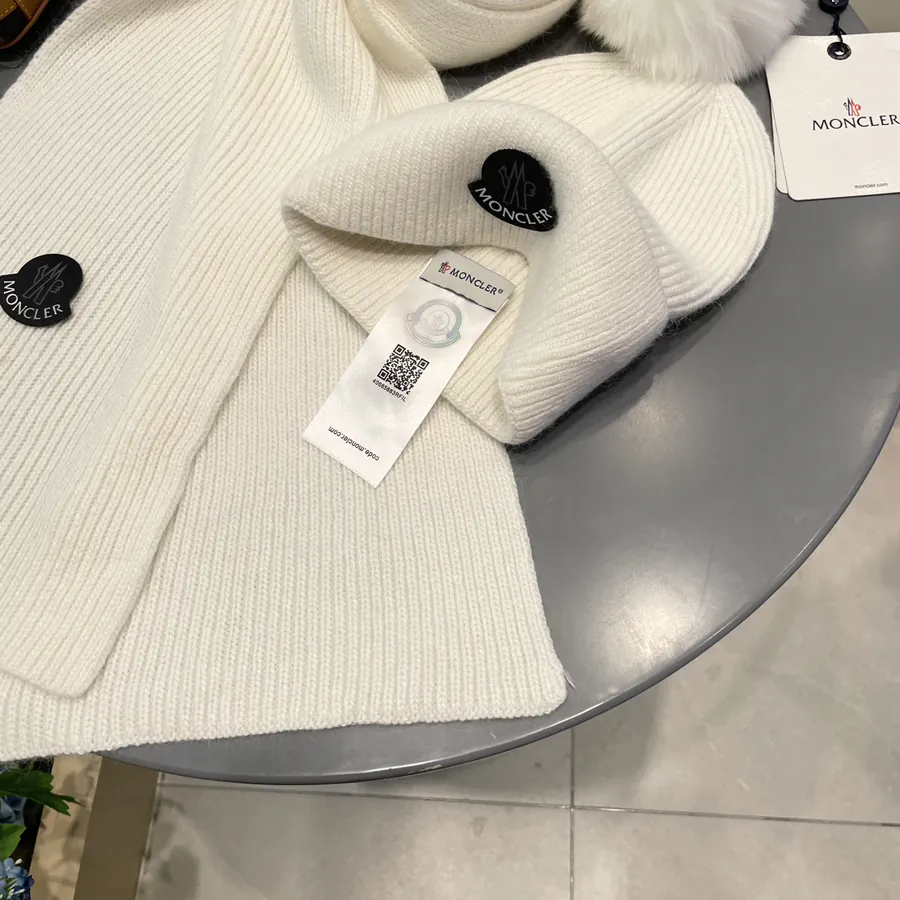 P150 MONTI Wool with Fox Fur Ball
