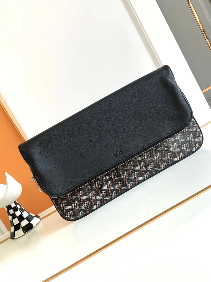 Sainte Marie Handbag with Dual Face Clutch Design