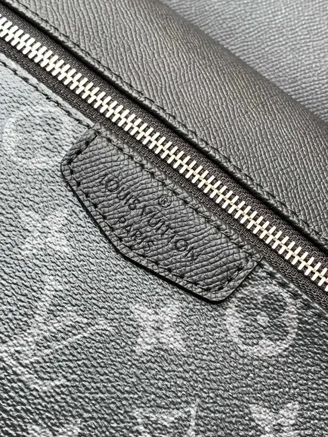 DISCOVERY Small Backpack with Monogram Canvas and Taïga Leather