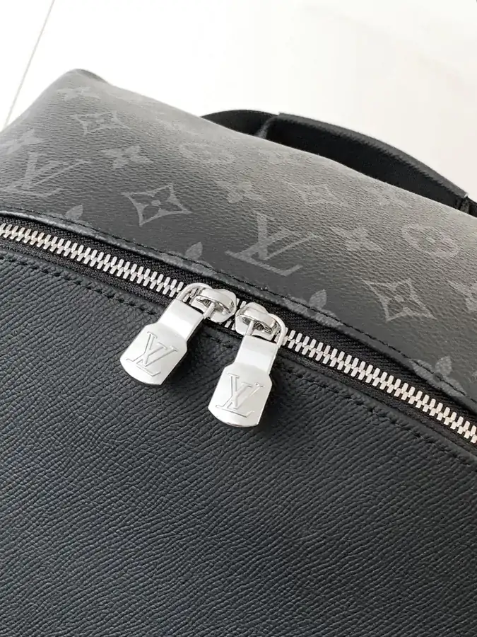 DISCOVERY Small Backpack with Monogram Canvas and Taïga Leather