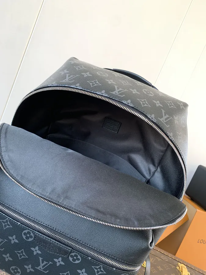 DISCOVERY Small Backpack with Monogram Canvas and Taïga Leather