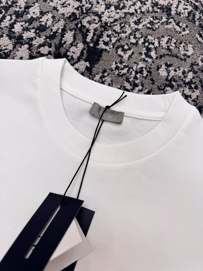 DIO.R AND KAWS 25ss New Collection T Shirt