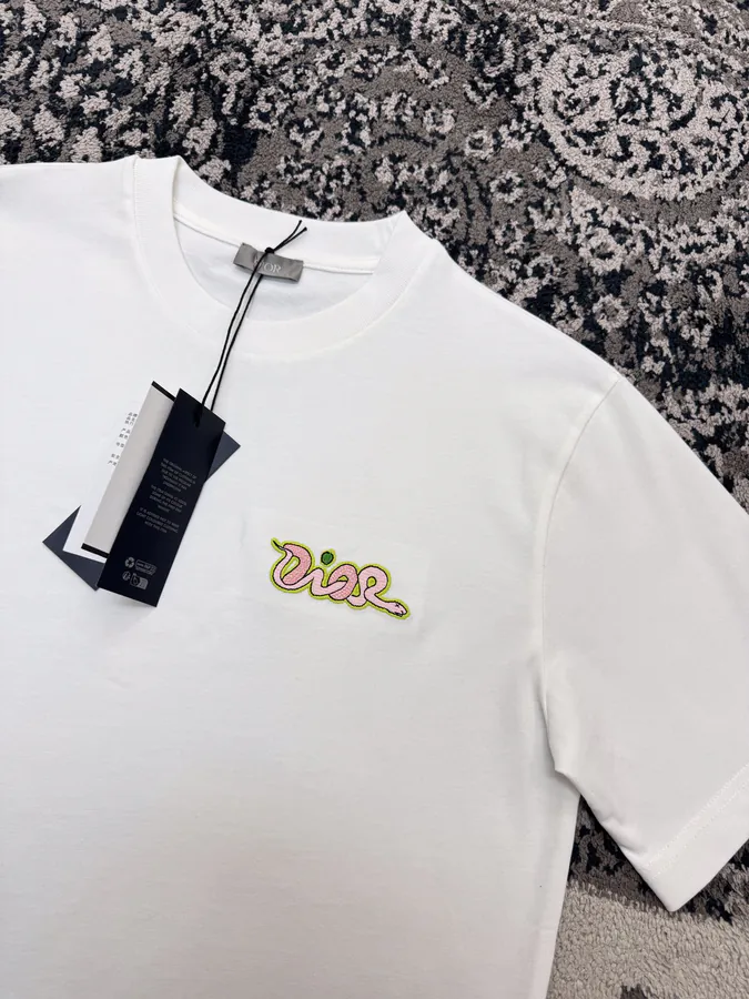 DIO.R AND KAWS 25ss New Collection T Shirt