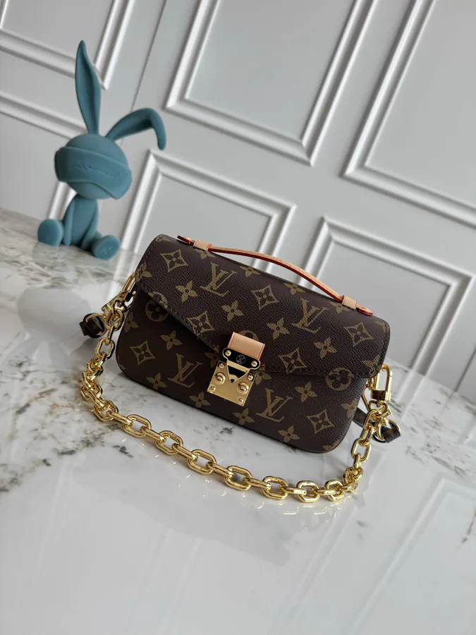 Pochette Métis East West Bucket Bag with Monogram Canvas and Leather Trim