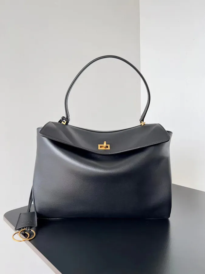 Baleenciaga Rodeo Oversized Bag with Graceful Silhouette