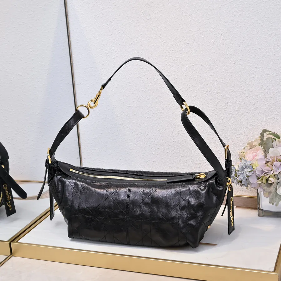 D Journey Bucket Bag Large, Black Calfskin, Cistian Paris Logo