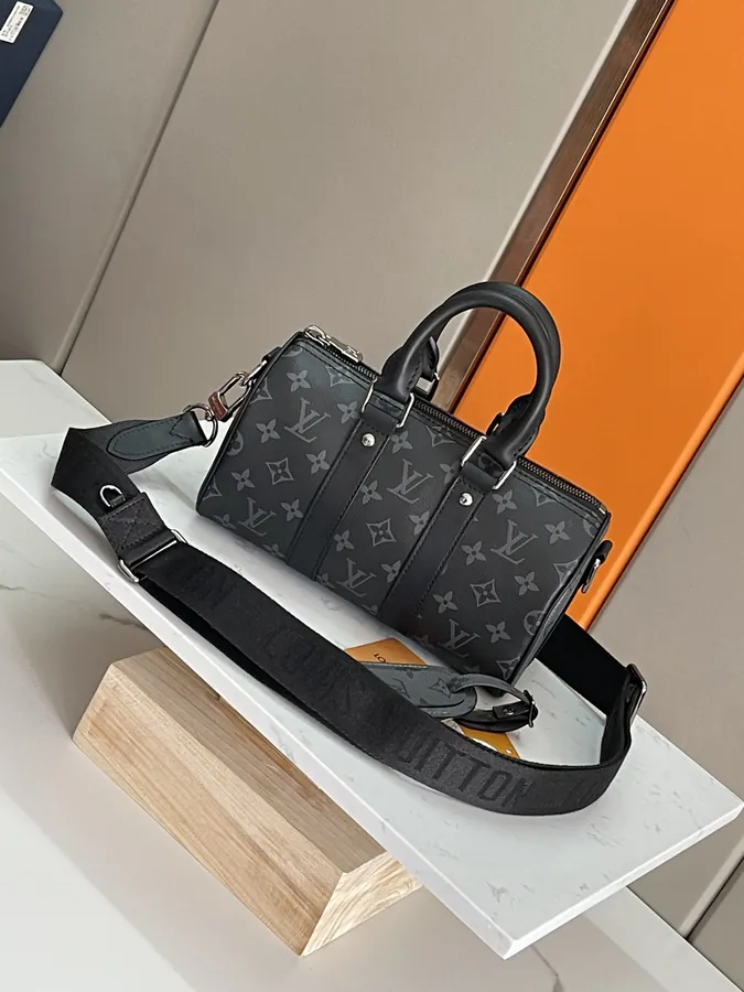 Louis Vuitton Keepall 25 Monogram Eclipse Reverse Canvas with Leather Trim