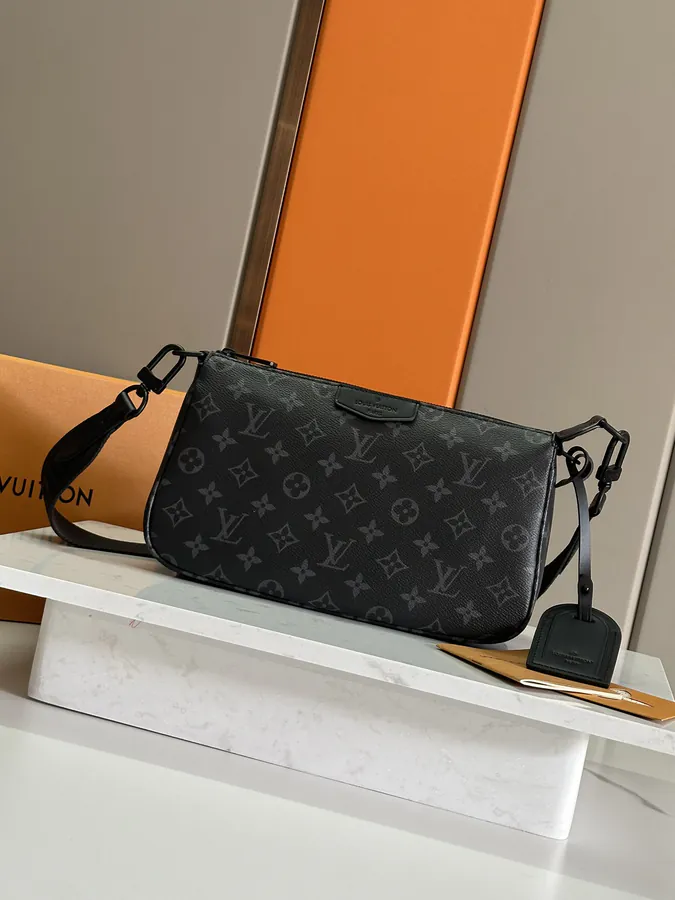 Pochette Accessoire XL Handbag with Monogram Eclipse Canvas and Calfskin Trim