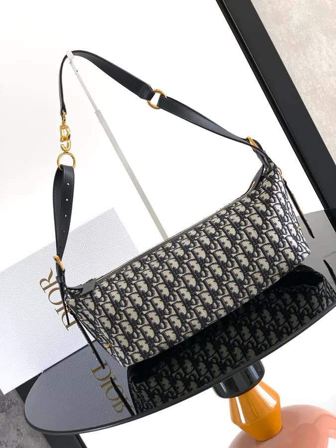 D Journey Handbag with Modern Design, Grained Calfskin, and Cistian Paris Logo