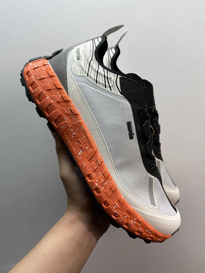 NORDA 001 G+ Spike in Gray and Orange