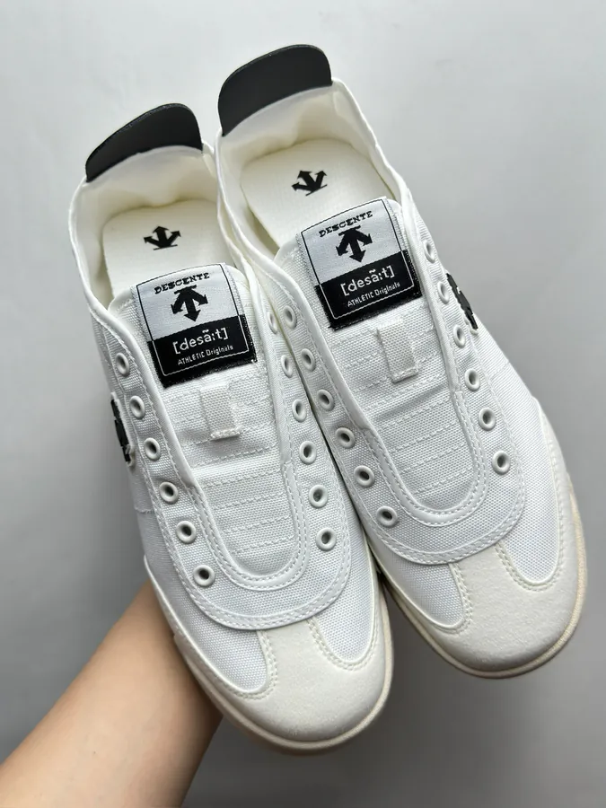 CON One Piece Slip On Shoes Black and White