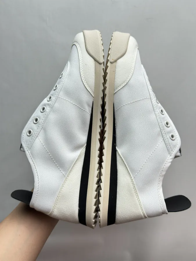 CON One Piece Slip On Shoes Black and White