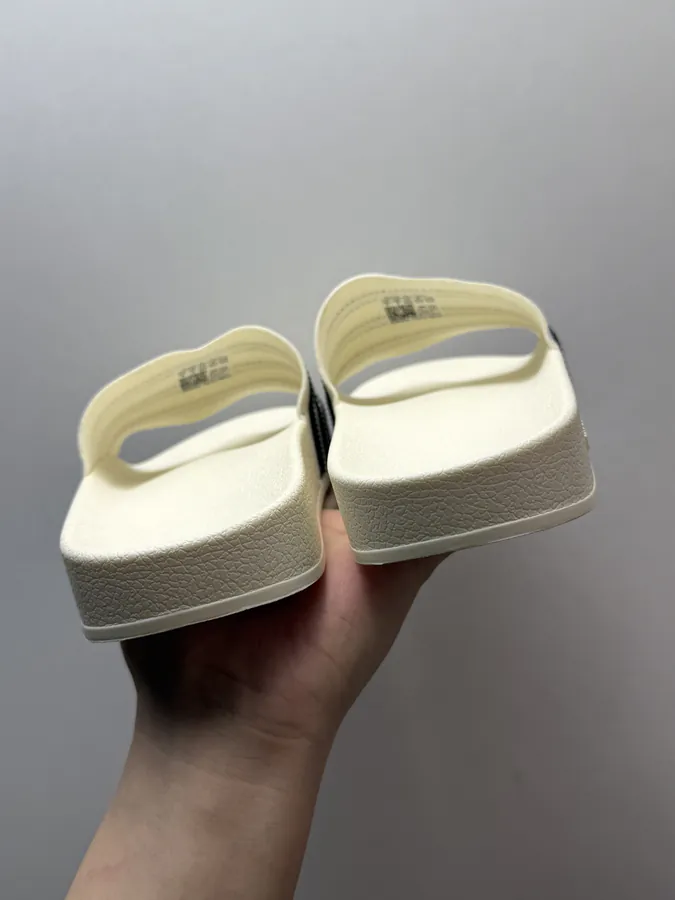 Fear of God x adidas Adilette Slides in Black and White