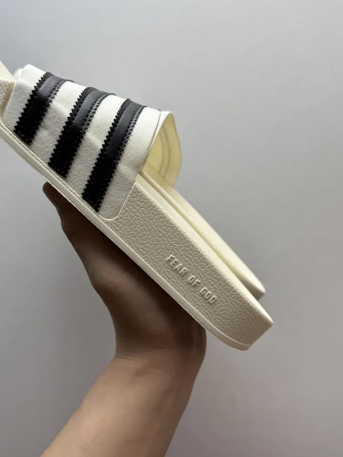 Fear of God x adidas Adilette Slides in Black and White