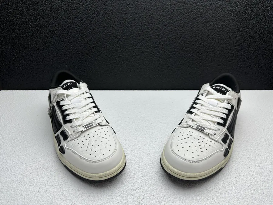 AMIRI Bone Low Top Sneakers in Black and White