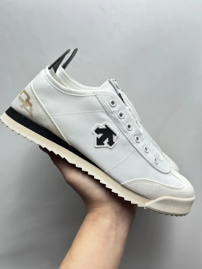 CON One Piece Slip On Sneaker in Black and White