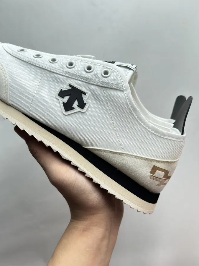 CON One Piece Slip On Sneaker in Black and White