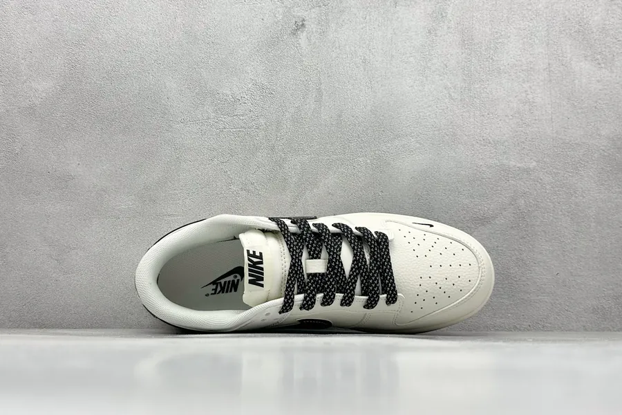 Nike SB Dunk Low in White and Black with Three Small Hooks