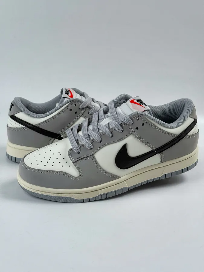 Nike Dunk Low in Gray, White, and Black
