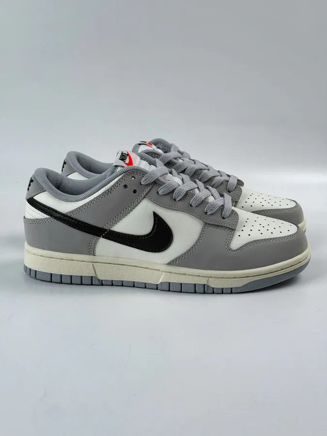 Nike Dunk Low in Gray, White, and Black