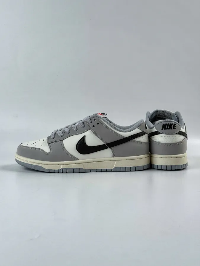 Nike Dunk Low in Gray, White, and Black