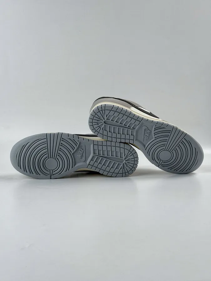 Nike Dunk Low in Gray, White, and Black