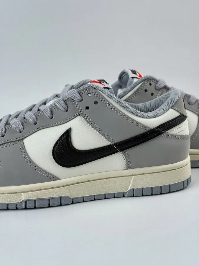 Nike Dunk Low in Gray, White, and Black