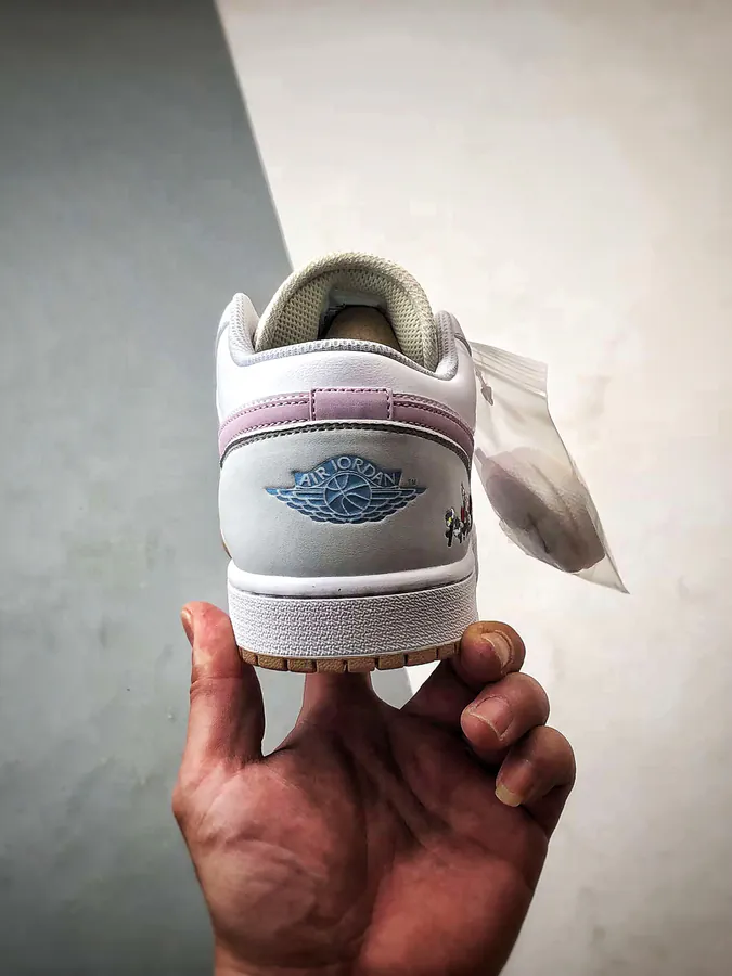 Air Jordan 1 Low in White, Gray, and Pink