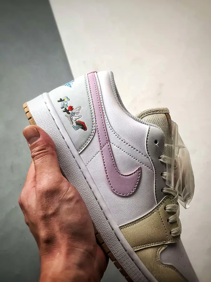 Air Jordan 1 Low in White, Gray, and Pink