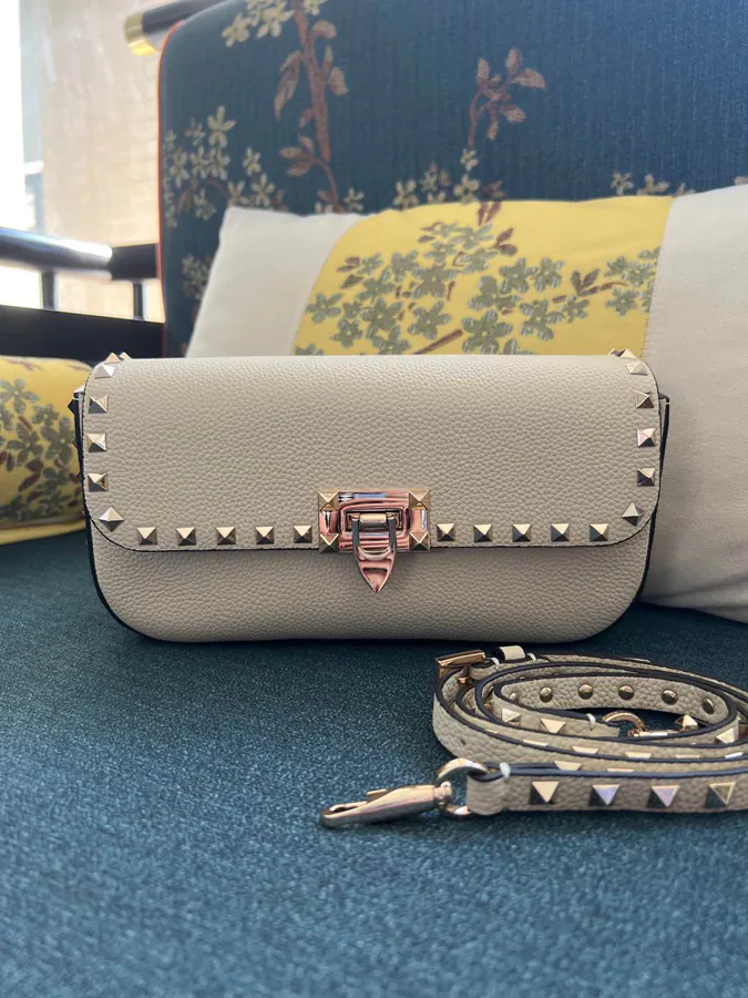 GARAVANI Rockstud Grained Calfskin Handbag with Signature Hook Closure