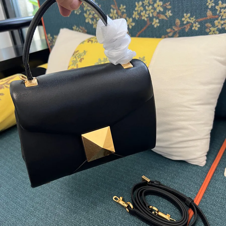 NEONE STUD Mini Sheepskin Handbag with Large Stud Closure