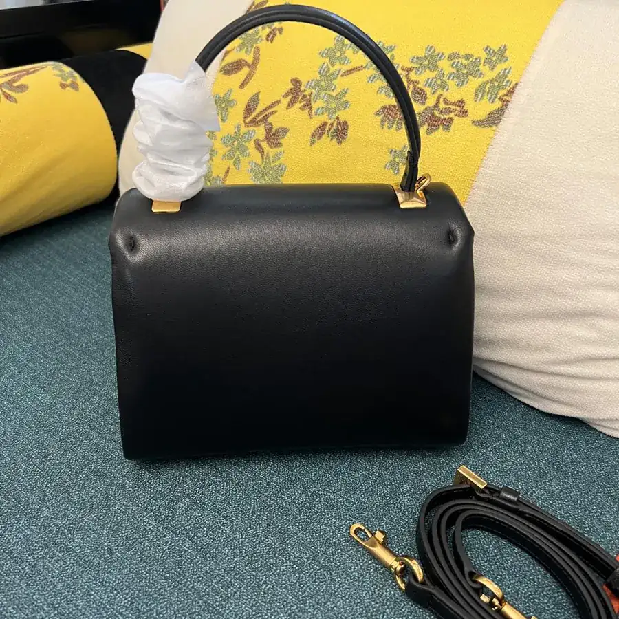 NEONE STUD Mini Sheepskin Handbag with Large Stud Closure