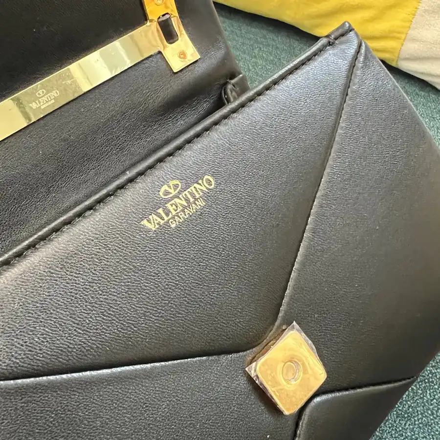 NEONE STUD Mini Sheepskin Handbag with Large Stud Closure