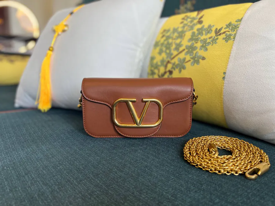 Garavani Mini Locò Calfskin Handbag with Metal VLogo Signature Details
