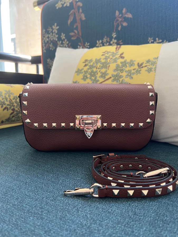 GARAVANI Rockstud Grained Calfskin Handbag with Signature Hook Closure